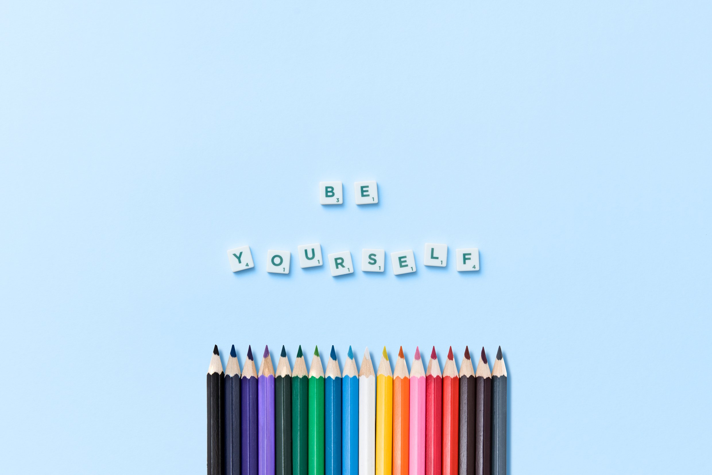 Message Arranged with Letter Tiles and Crayons 